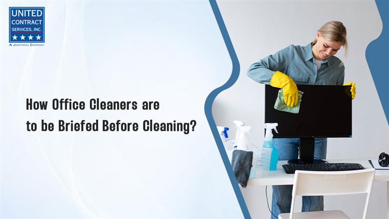 Office cleaners getting briefed and ready to clean a workspace professionally and efficiently.